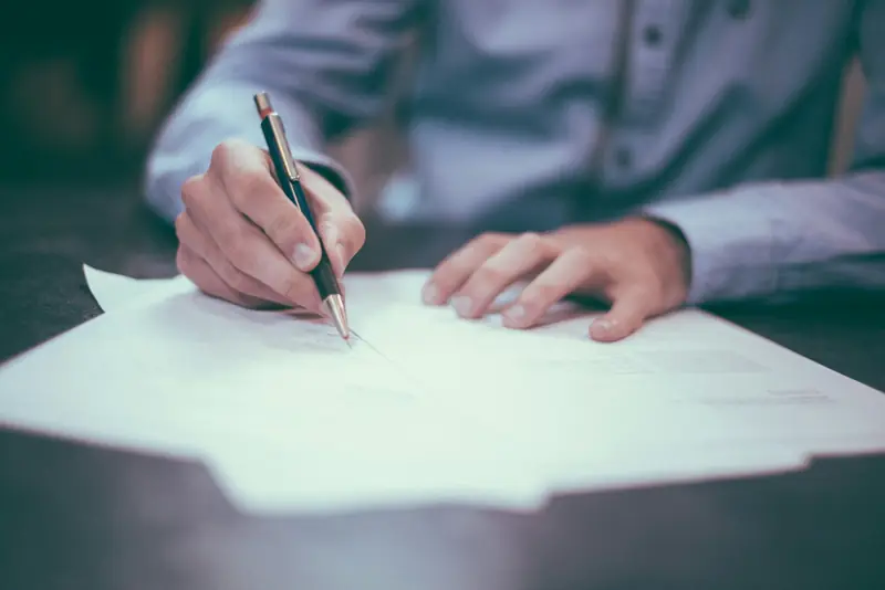 An employer signing a group health insurance application